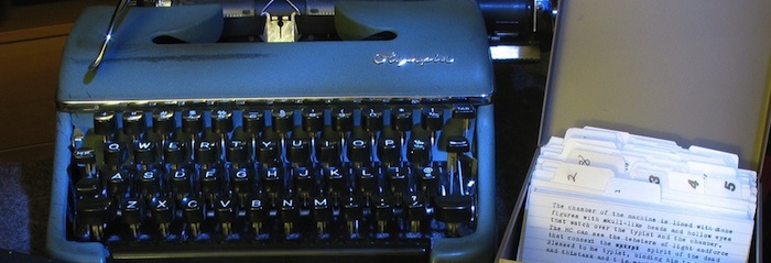typewriter and index cards
